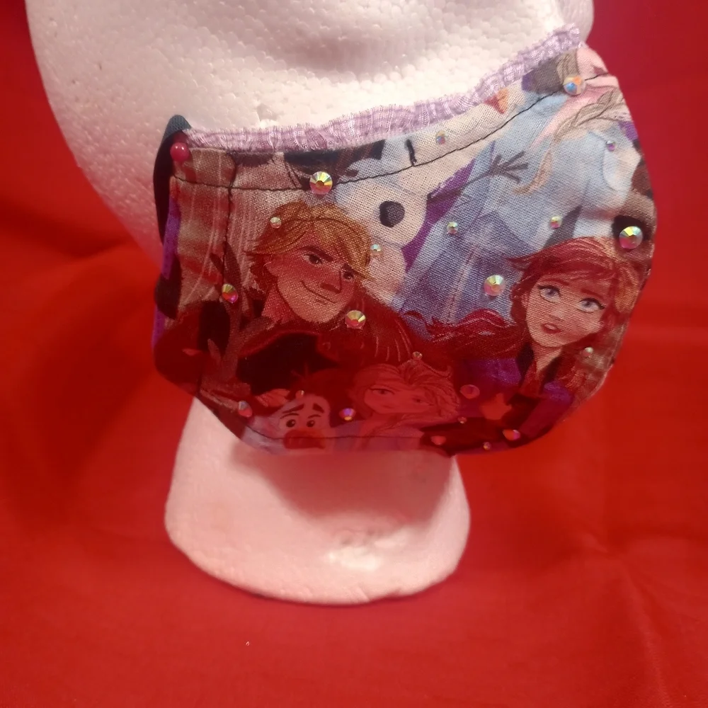 SKU 900KM Frozen Pattern With Studs, Adjustable Earpieces.